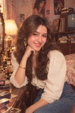 Cinematic 1980s Retro Vintage Editorial Portrait Woman Sitting at Vanity Table