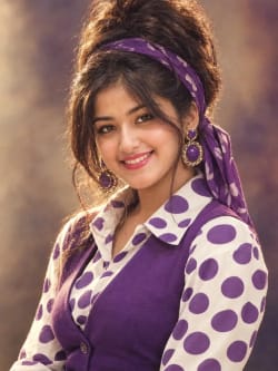 Retro 1990s Indian Woman Studio Fashion Portrait in Polka Dot Blouse