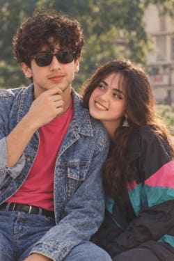 Retro 1990s Indian Couple Portrait With Acid Wash Denim Jacket