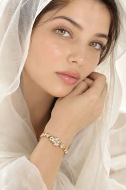 Close-Up Beauty Portrait of Woman With White Veil and Bracelet
