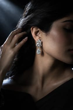 Film Noir Studio Portrait of Woman Wearing Luxury Diamond Earring