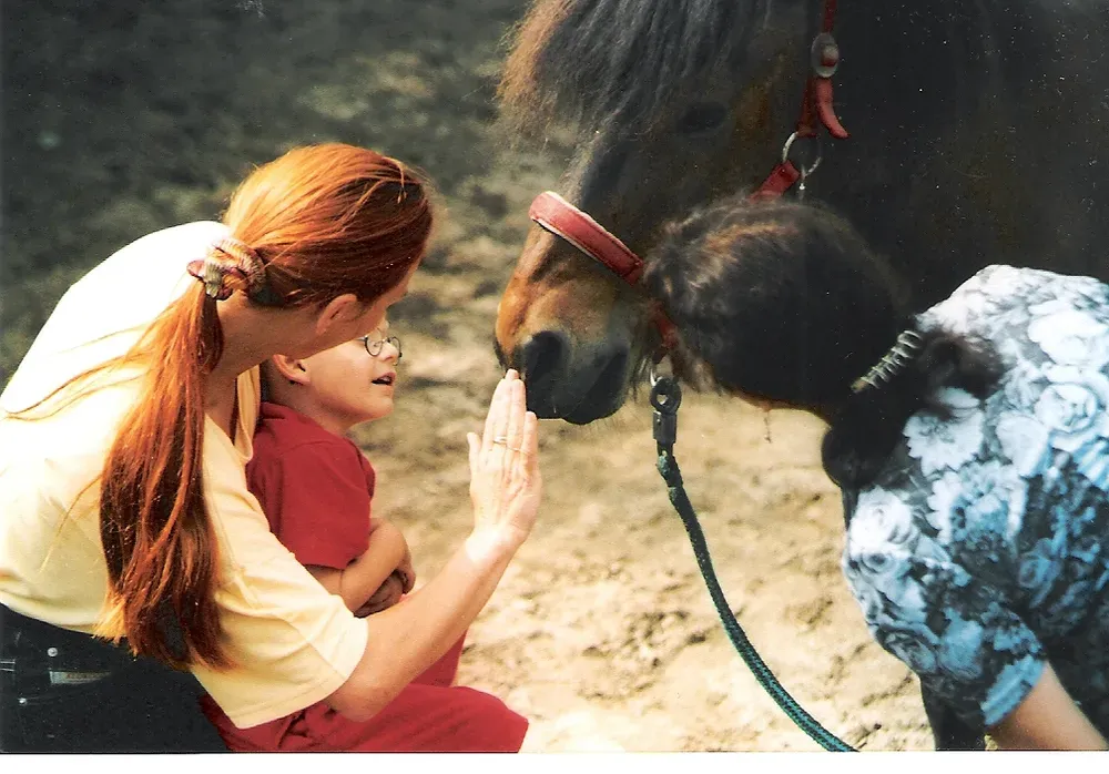 child and pony