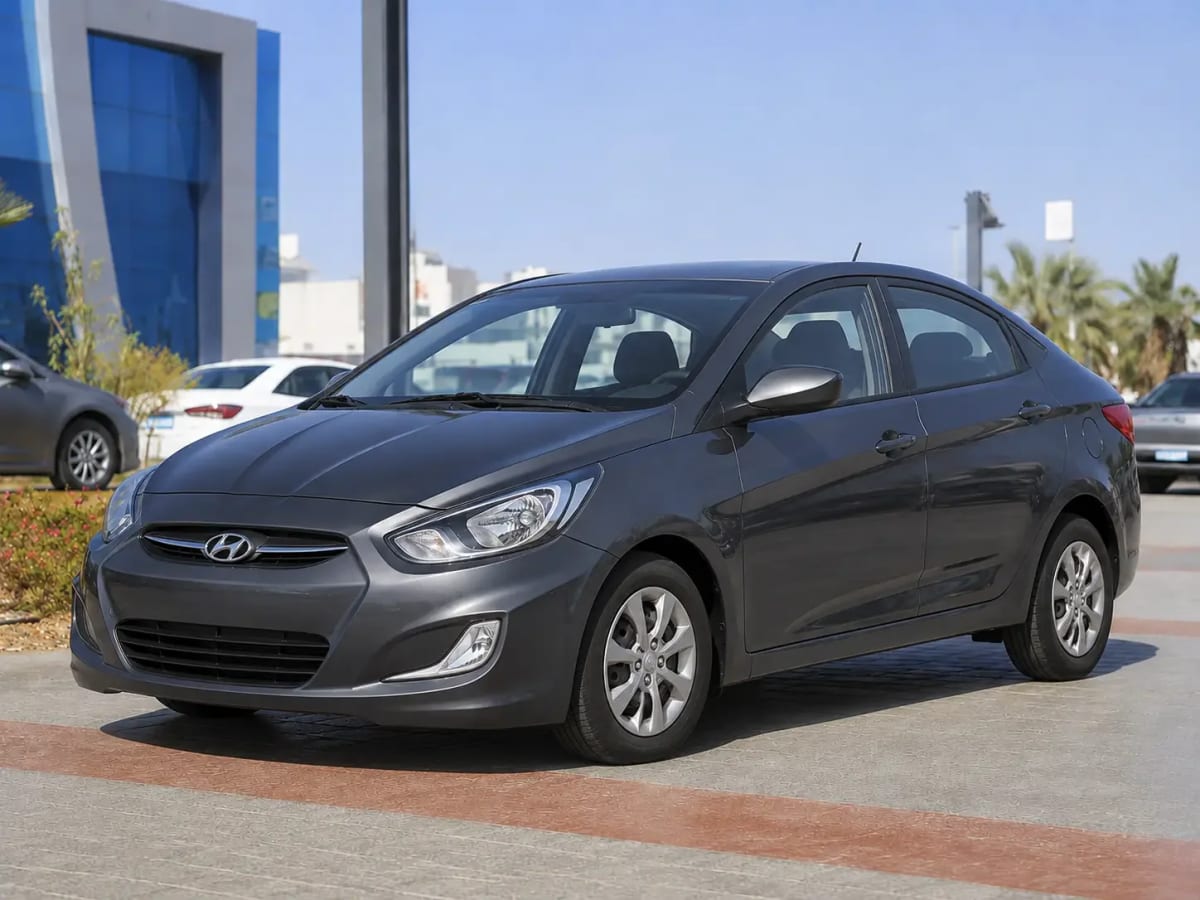 Front three-quarter view of the gunmetal Hyundai Accent RB 2015 available from OnTime Sharm car rental