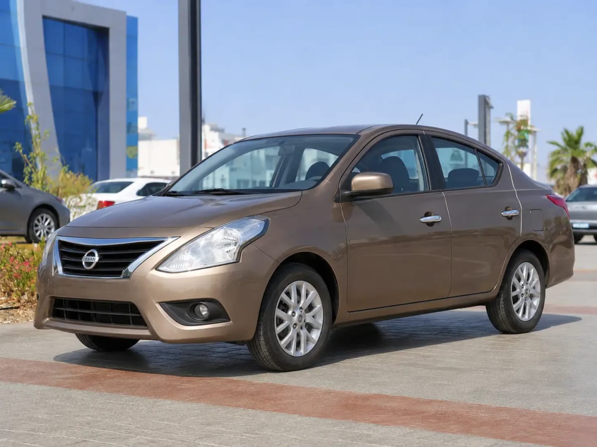 Front three-quarter view of the bronze Nissan Sunny 2022 available from OnTime Sharm car rental