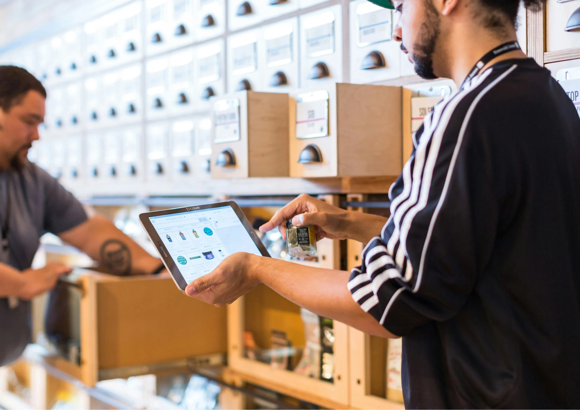 Man checking software for the management of a warehouse and inventory