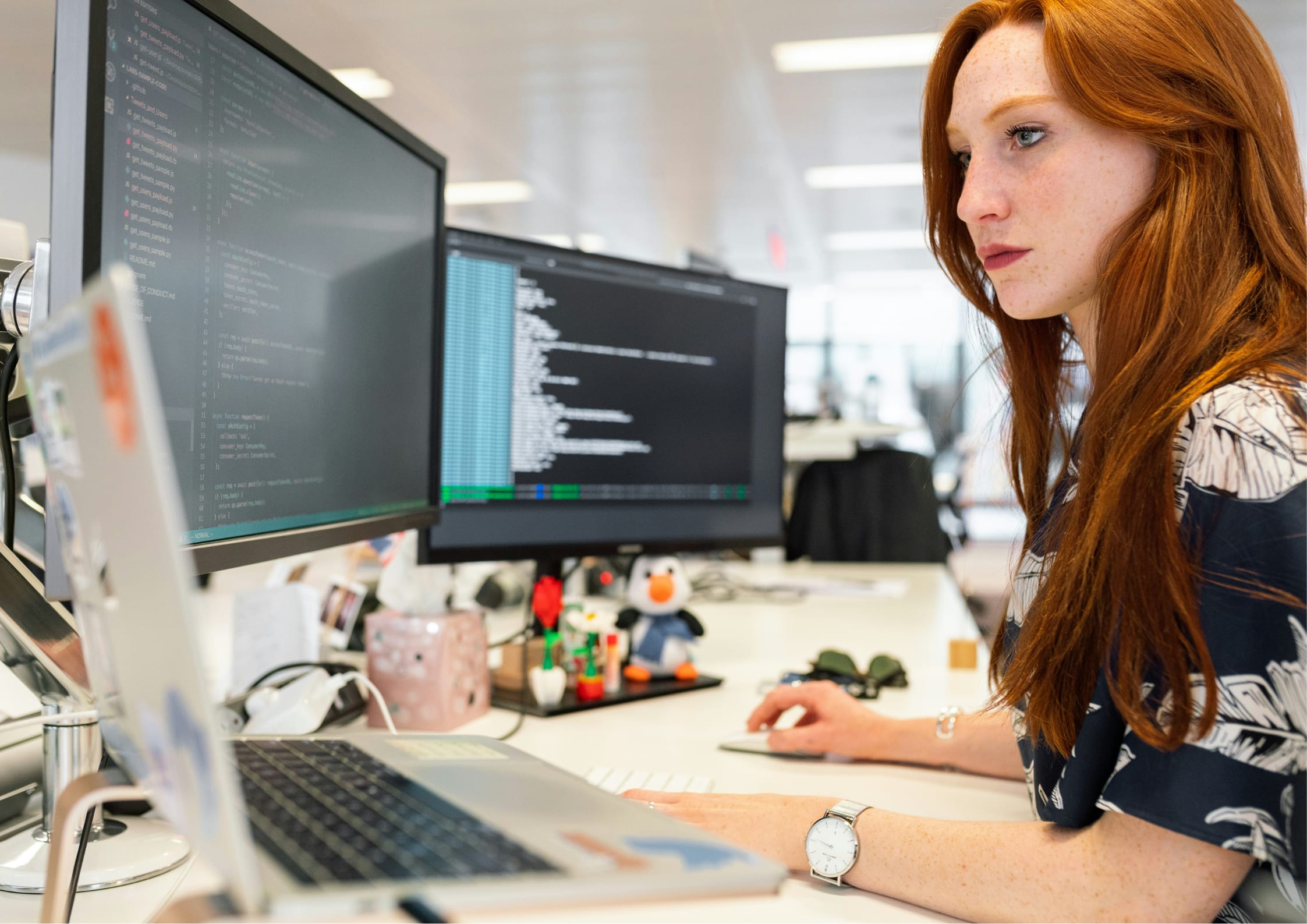 woman working on a reordering system in warehouse management software