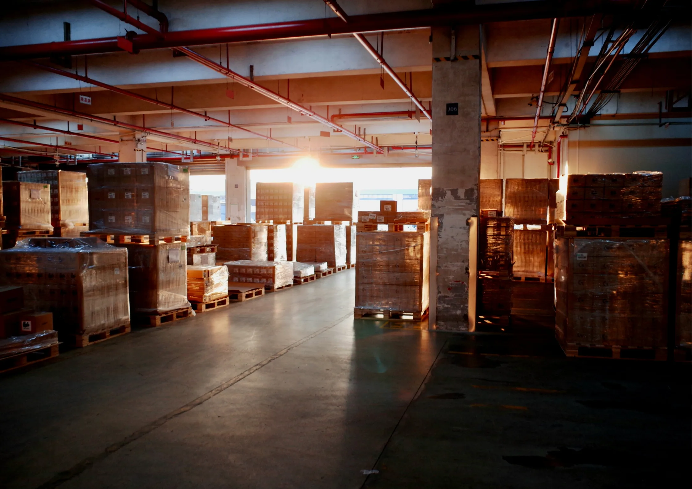 Back of warehouse shot of outdoor peering into warehouse