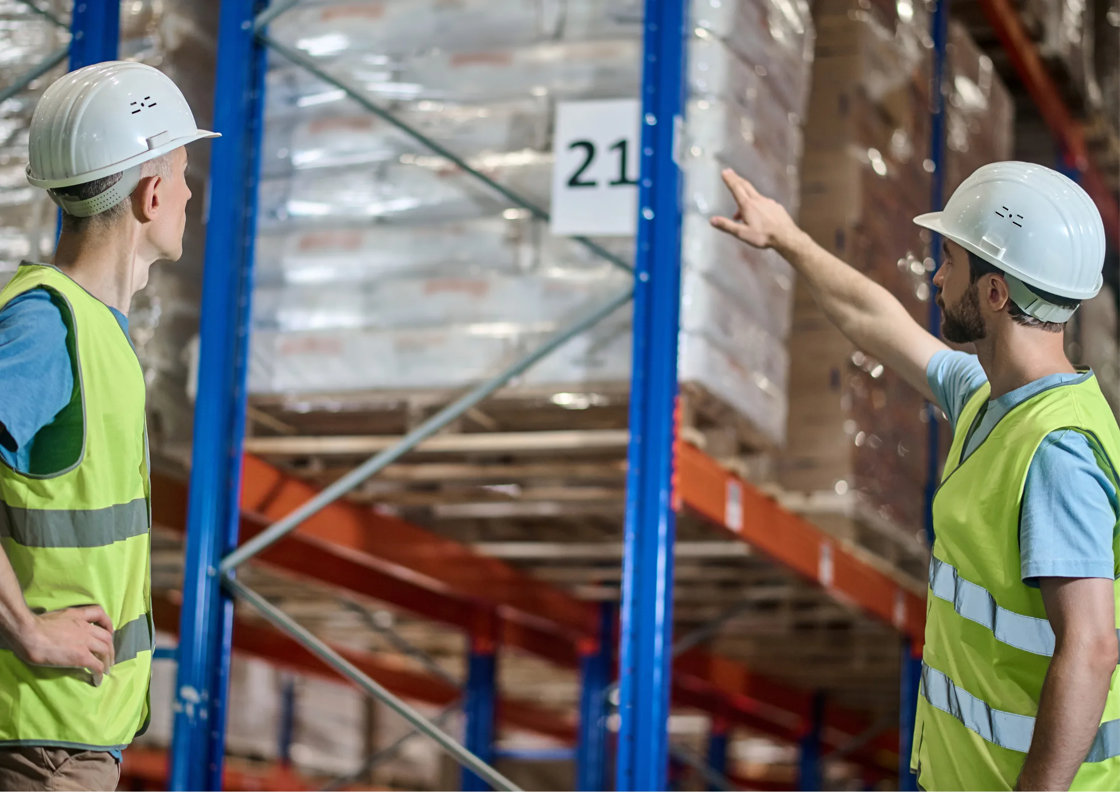 Man points at large bulk items in warehouse