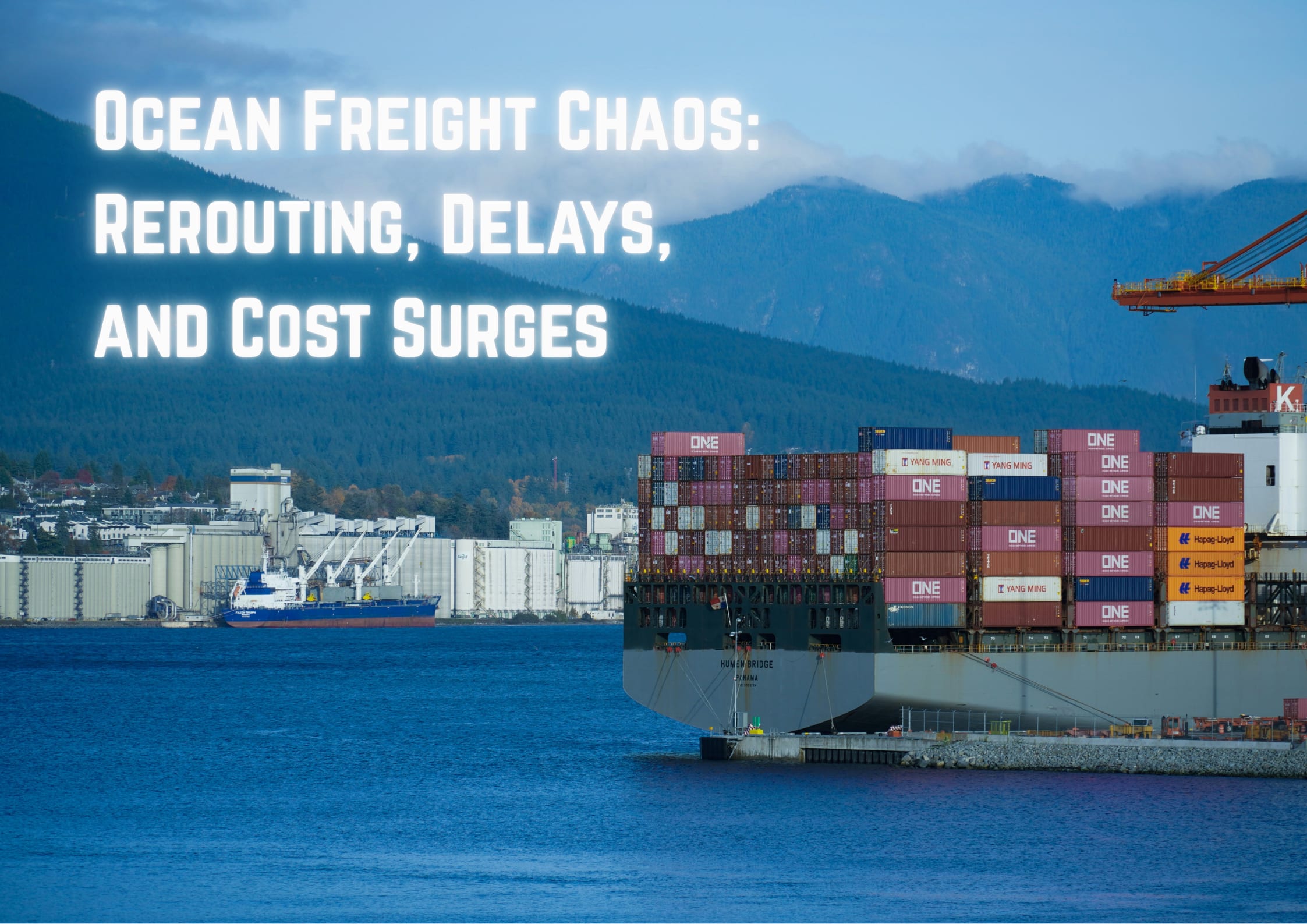 Shipping containers on a freight carrier overseeing the mountains