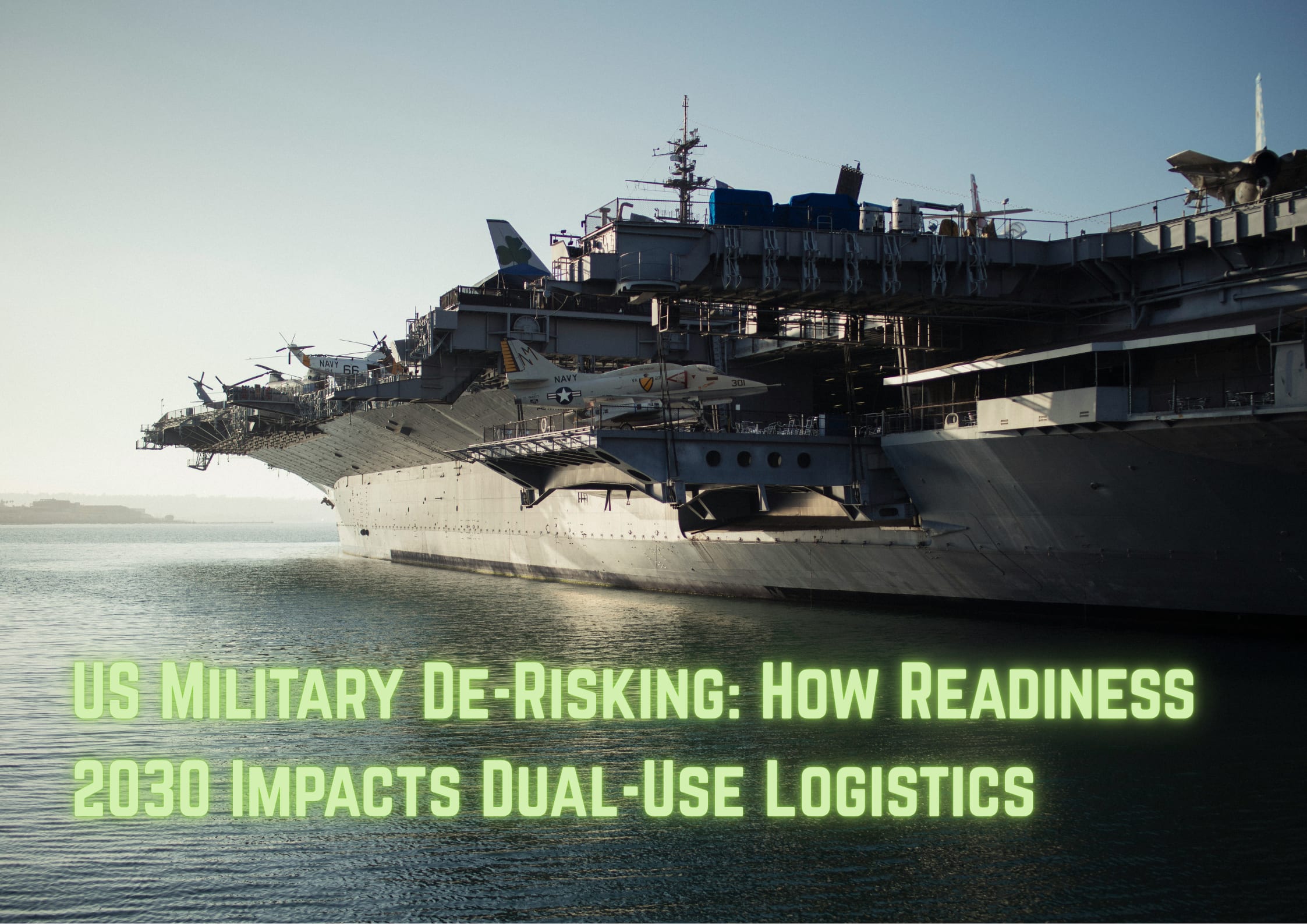 Low profile side shot of aircraft carrier in the ocean representing the military derisking in global dual use logistics impacts