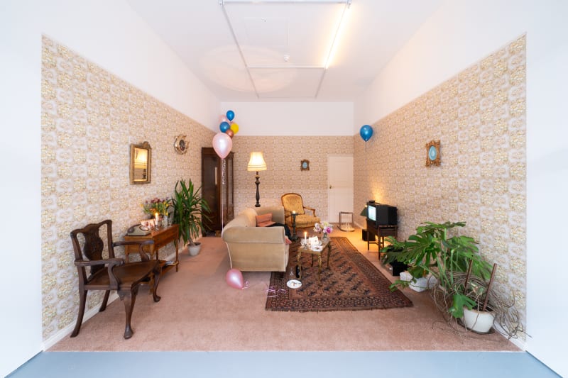 frontal view of the 1980s living room installation