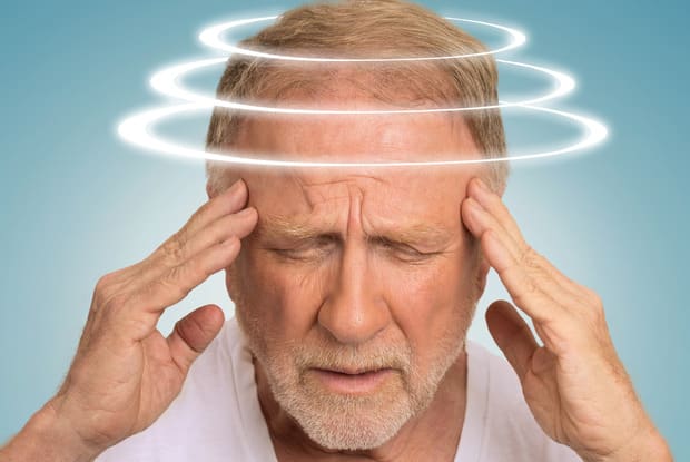 a man experiencing dizziness