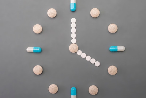 pills in shape of clock