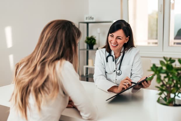 a doctor talking to her patient