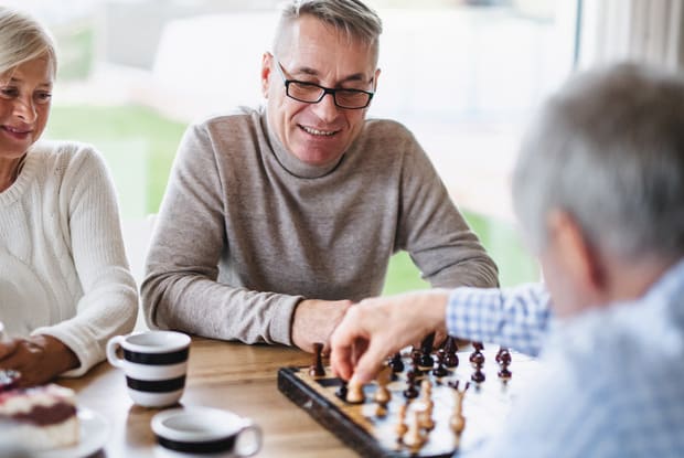 older men playing chess