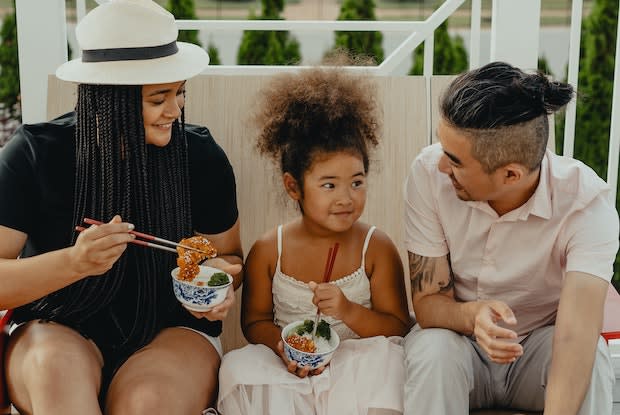 a family enjoying some food