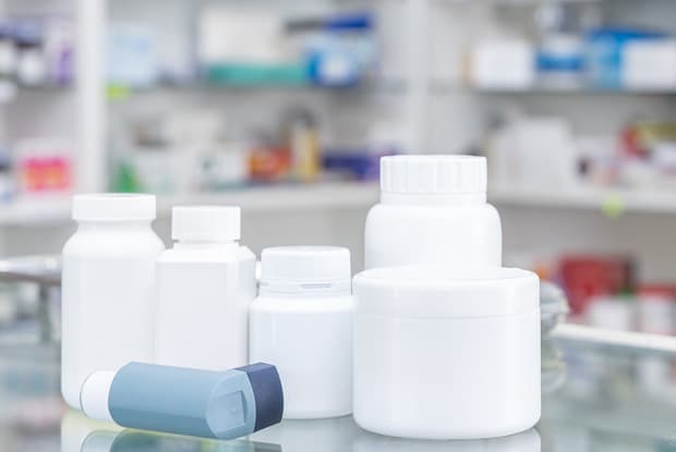 medicine bottles and pharmacy shelves