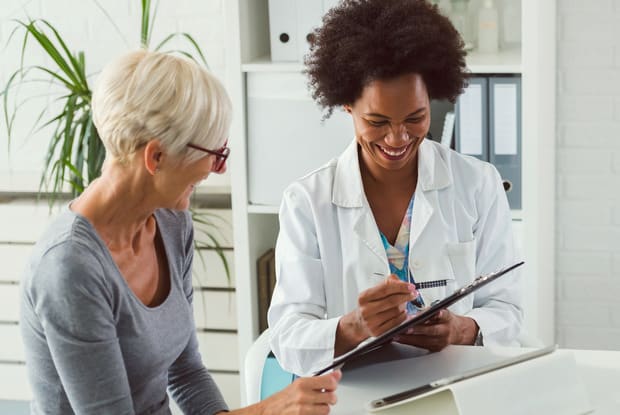 a doctor talking to her patient