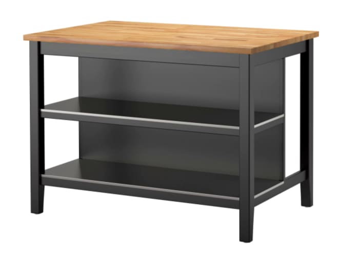 Kitchen island. The open shelving underneath can be successfully used as a waste management station.