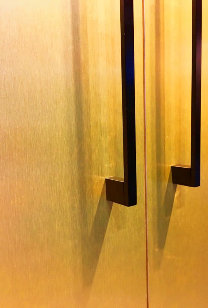 Close up of the gold fridge door.
