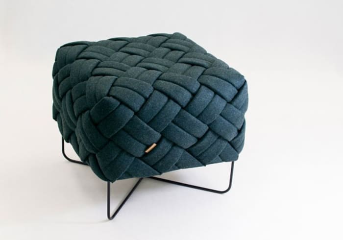 Stool with wool knotted seat and thin metal legs, by Kumeko Design.