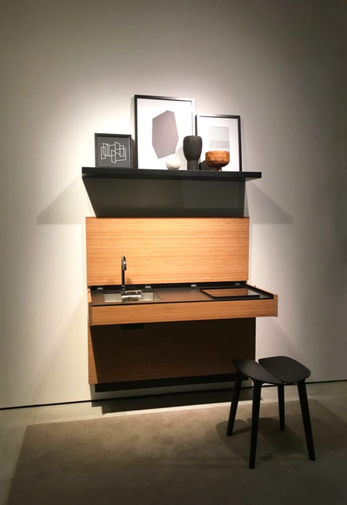 Extra small invisible kitchen, perfect to create an open plan design in small spaces.