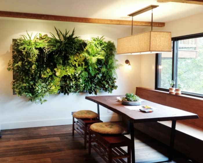 Garden wall design as a hanging artwork in a dining area. Garden wall design as a hanging artwork in a dining area.