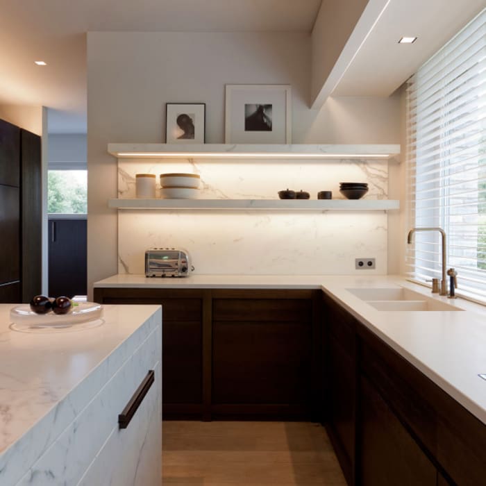 Minimalist kitchen design with lit shelves. Minimalist kitchen design with lit shelves.