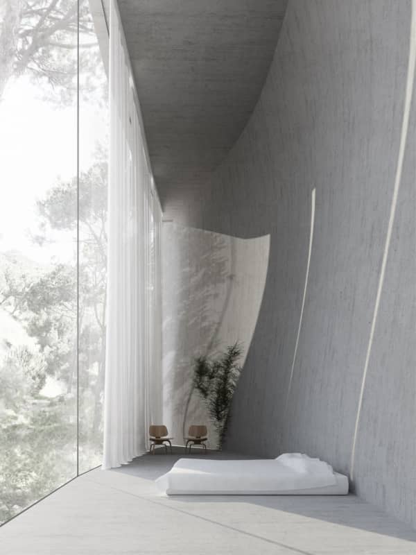 Full-height window looking into the forest, great option to create a sense of risk in a biophilic design.