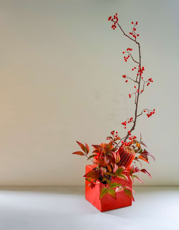 Totally asymmetric Ikebana arrangement, perfect décor in a minimalist interior.
