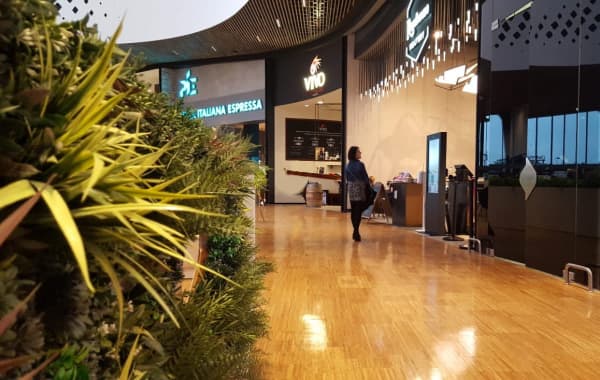 Another indoor view of CityLife shopping district, an example of biophilic design.