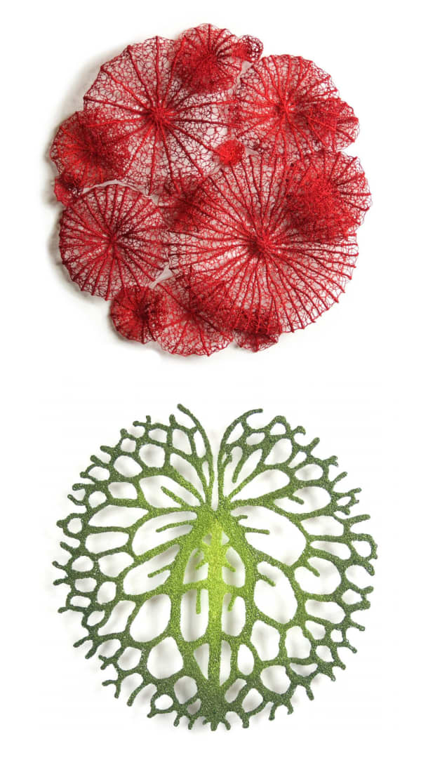 Close-up of some of the embroidered works showing the patterns.