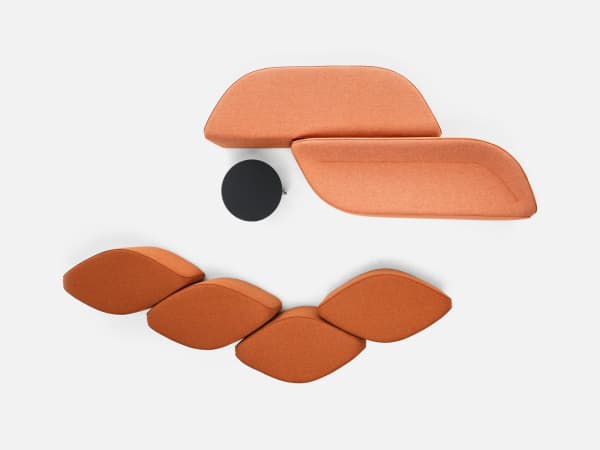 Modular bench with a sinuous organic shape.