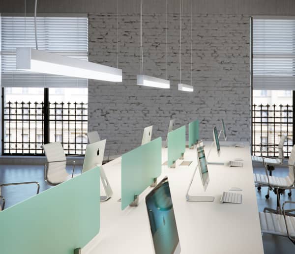 Smart pendant light over a working station.