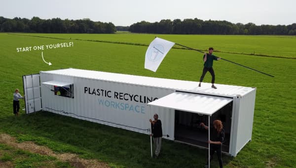 A shipping container turned into the Precious Plastic workspace.