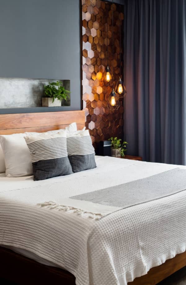 Close-up view of the feature wall behind the bed.