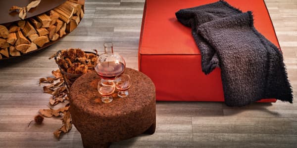 Dark cork ottoman, perfect for a biophilic outdoor.