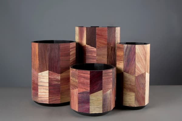 Vases made of Totomoxtle, a corn husk-based biomaterial.