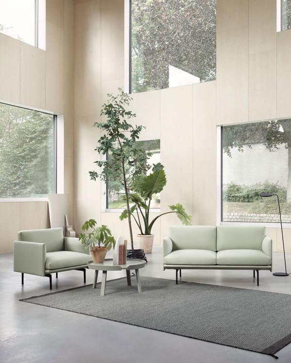 Biophilic sitting area in a room with very high ceilings and Tranquil Dawn furniture.