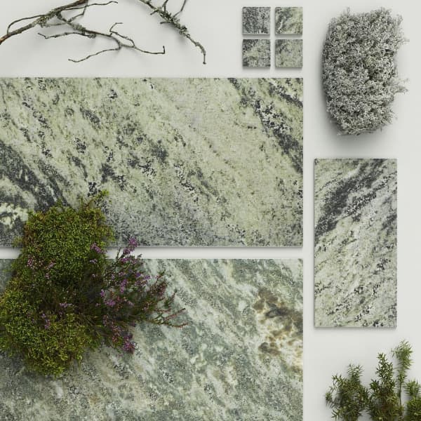 Biophilic tiles recalling the texture of moss.
