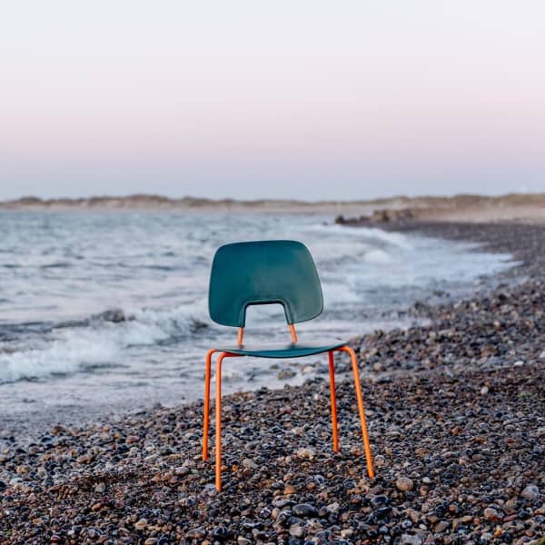 Chair made with fishing net and recycled steel.