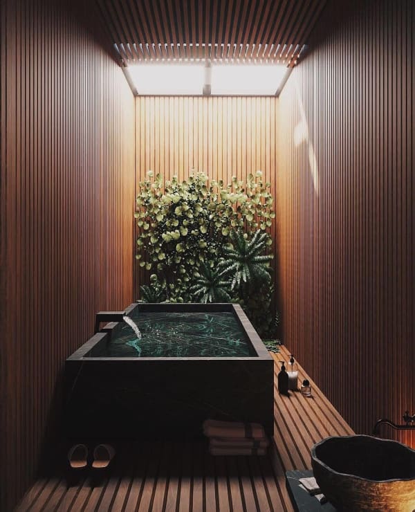 Cozy wooden bathtub area.