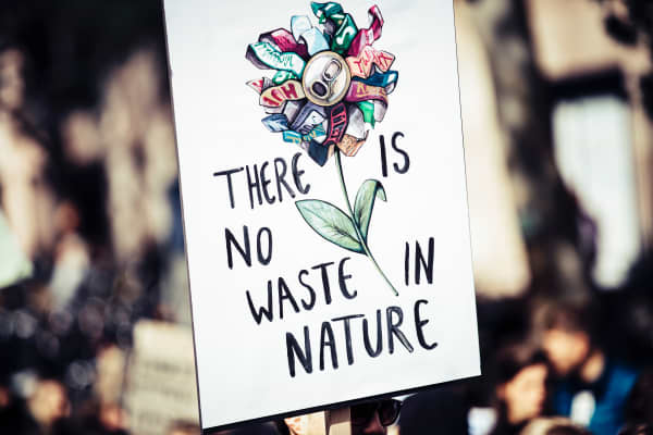 Climate change sign saying "There is no waste in nature".