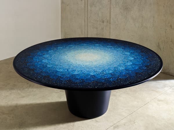 Mosaic effect table made using ocean plastic fragments.