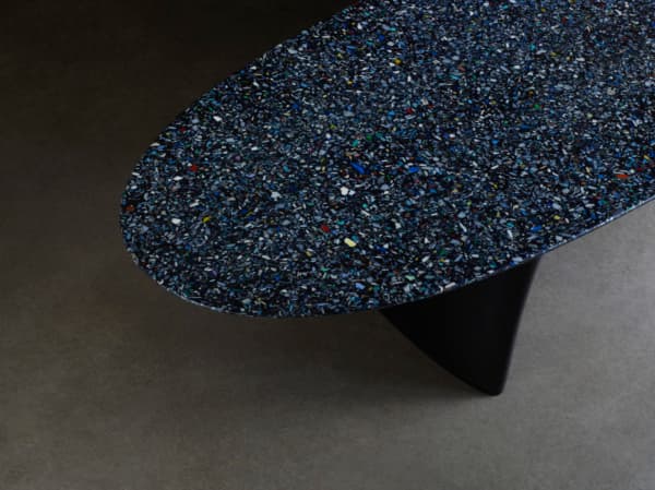 Close-up of the bench top texture made using ocean plastic fragments.
