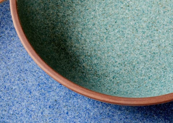 Close-up shot of the flecked colour of the plates.