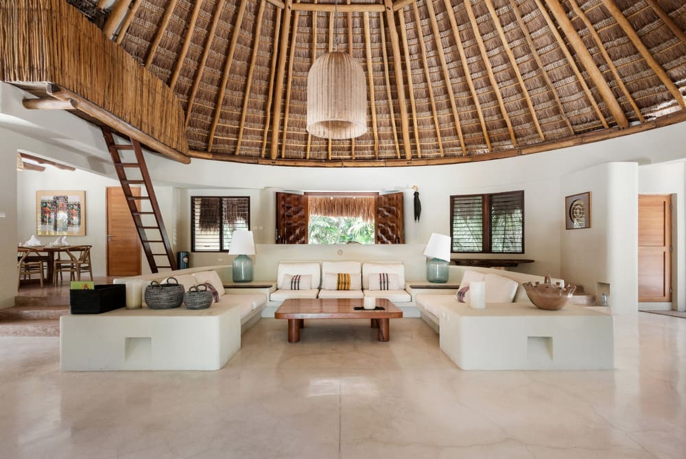 Living area of Casa Nalum, with straw hut roof.<span class="sr-only"> (opened in a new window/tab)</span>
