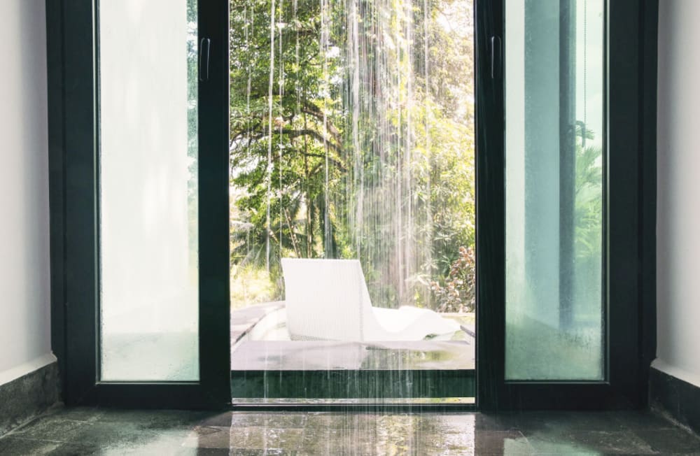 The pool's access to a rainfall walk-in shower.<span class="sr-only"> (opened in a new window/tab)</span>