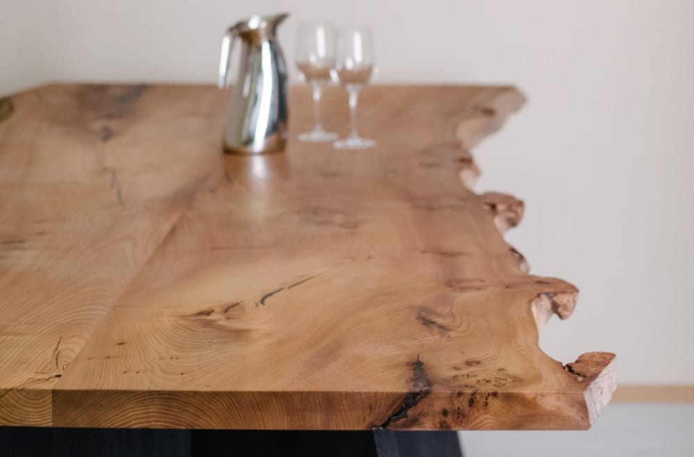 Wooden table with a live edge.<span class="sr-only"> (opened in a new window/tab)</span>