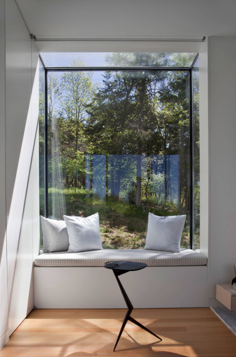Window seat overlooking greenery.<span class="sr-only"> (opened in a new window/tab)</span>